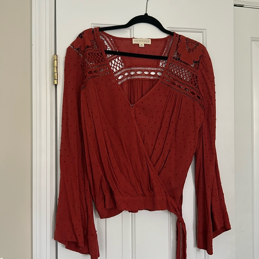 Lovestitch size medium long sleeve top.
